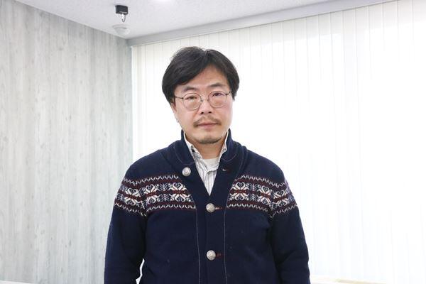 深井英喜センター長